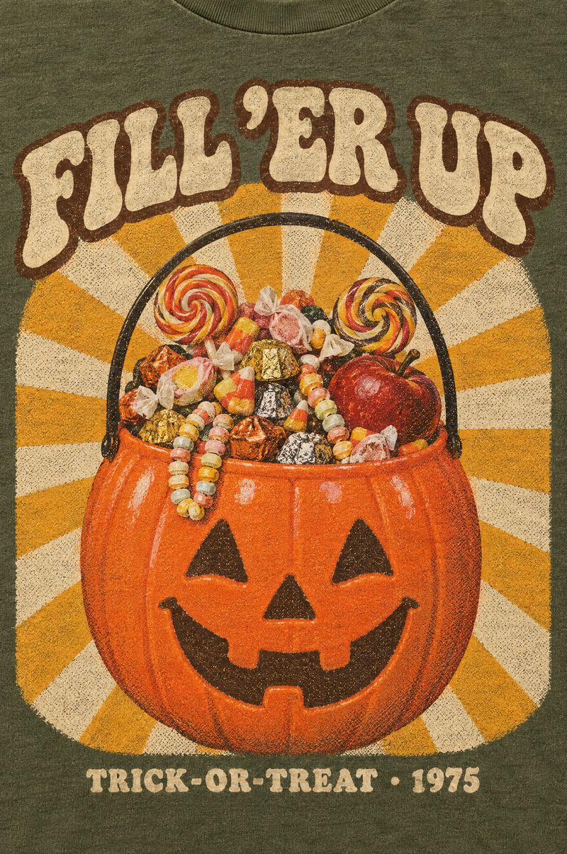 Moss green tee printed with an orange plastic jack-o’-lantern candy pail overflowing with candy in front of a sunburst, words Fill ’Er Up, Trick-or-Treat 1975